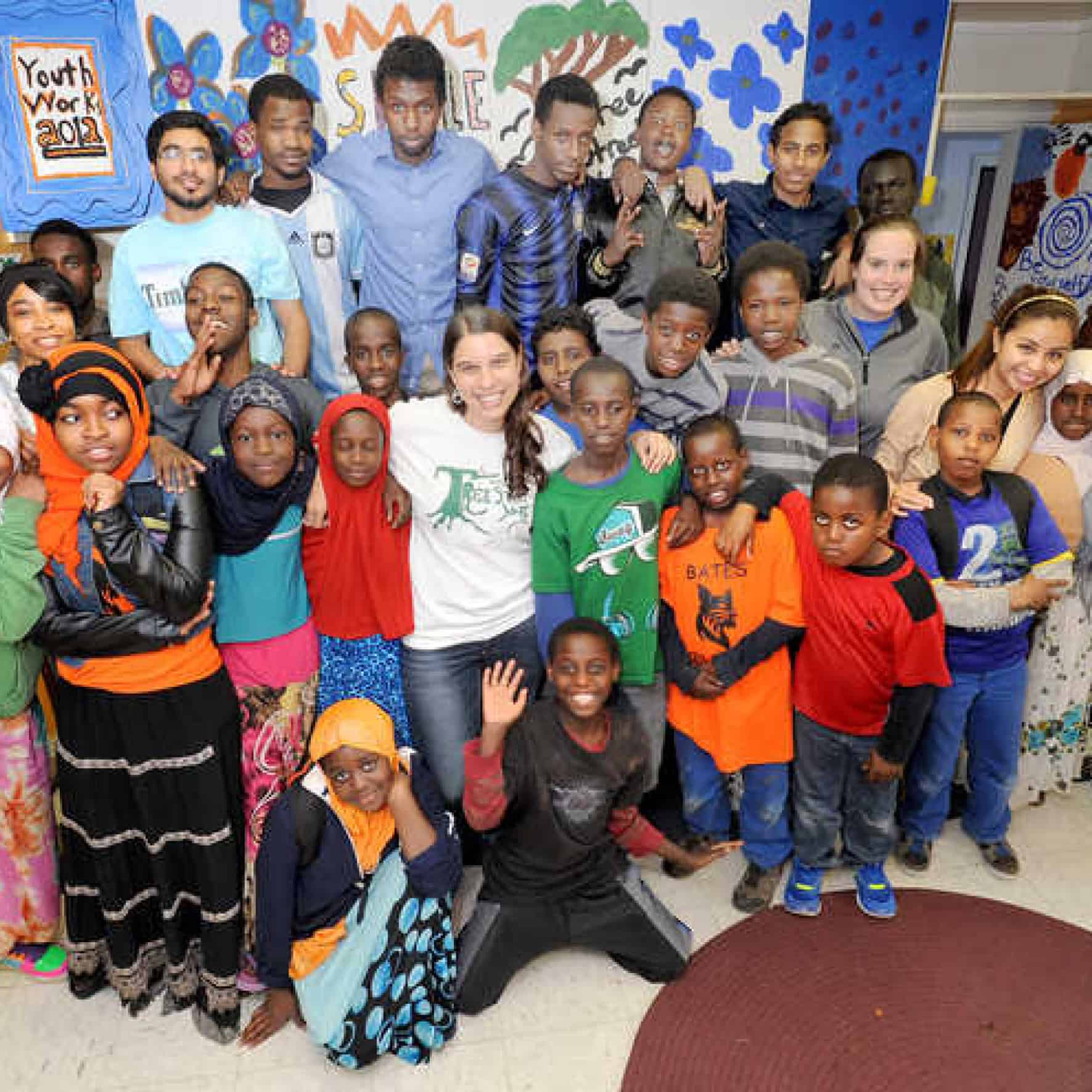 A group of students gather in a classroom at Tree Street Youth in Lewiston, a project which happened with Genesis Fund guidance and financing.